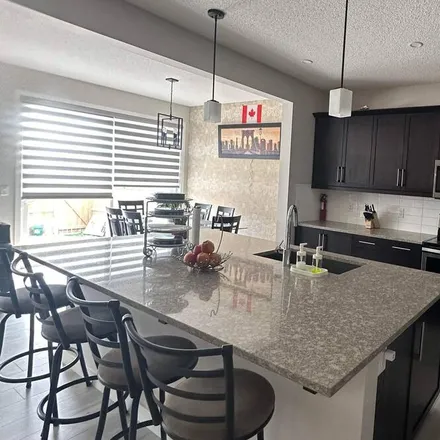 Rent this 5 bed house on Calgary in AB T3N 1K8, Canada