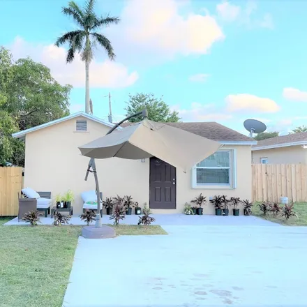 Buy this 5 bed house on 1390 Northwest 103rd Street in Pinewood, Miami-Dade County