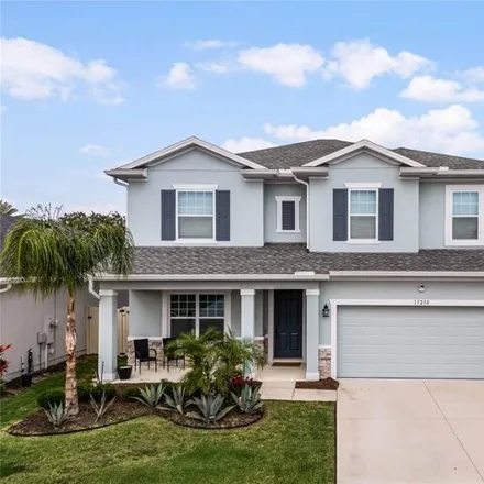 Buy this 4 bed house on 17238 Hickory Wind Drive in Clermont, FL 34740