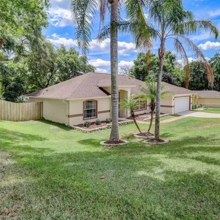 Buy this 3 bed house on 1336 Rain Forest Lane in Minneola, FL 34755
