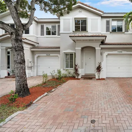 Rent this 4 bed townhouse on 11230 Northwest 56th Street in Doral, FL 33178