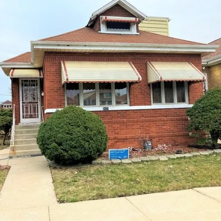 Buy this 4 bed house on 9425 South Eberhart Avenue in Chicago, IL 60619