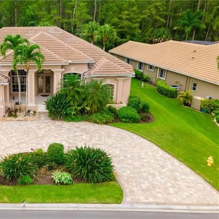 Buy this 4 bed house on 9836 Rocky Bank Drive in Collier County, FL 34109