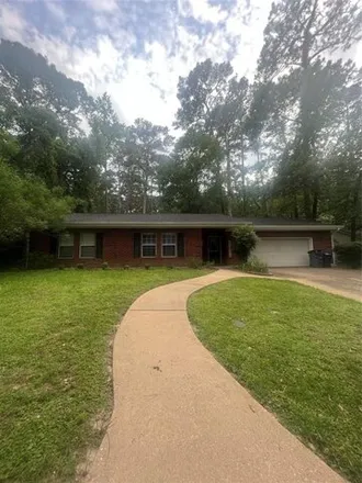 Rent this 3 bed house on 2111 Greentree Drive in Huntsville, TX 77340