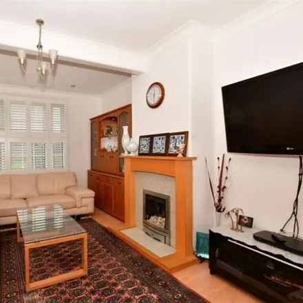 Buy this 2 bed townhouse on 325 St. Helier Avenue in London, SM4 6JR