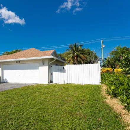 Buy this 3 bed house on 269 Northwest 12th Avenue in Boca Raton, FL 33486