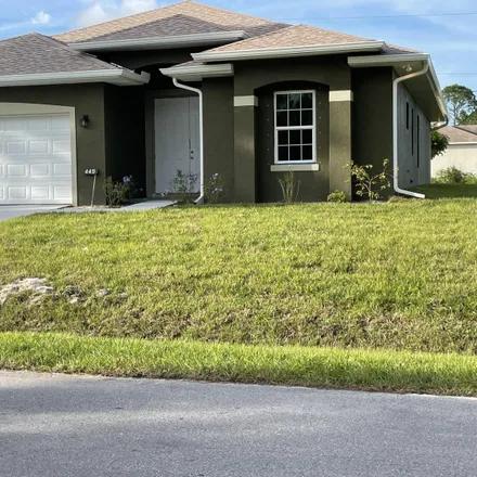 Buy this 4 bed house on 450 Old Road Southwest in Palm Bay, FL 32908