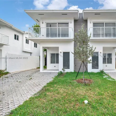 Rent this 3 bed townhouse on 6311 Northwest 1st Place in Edison Center, Miami