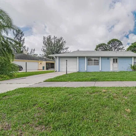 Buy this 2 bed house on 532 NW Floresta Dr in Port Saint Lucie, Florida