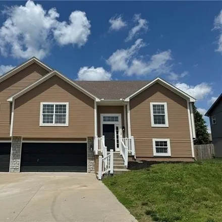 Buy this 4 bed house on 1144 Creekside Court in Raymore, MO 64083