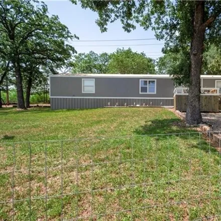 Buy this studio apartment on 344 Derrick Rd in Luling, Texas