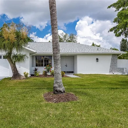 Buy this 3 bed house on 1402 Southwest 5th Avenue in Cape Coral, FL 33991