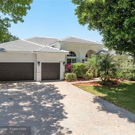 Buy this 5 bed house on 5058 Northwest 112th Drive in Coral Springs, FL 33076