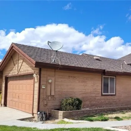 Buy this 3 bed townhouse on Conklin Court in California City, CA 93505