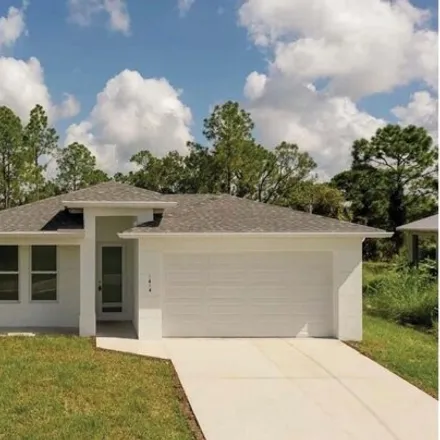 Buy this 4 bed house on 3323 56th Street West in Lehigh Acres, FL 33971