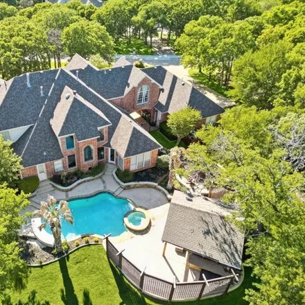 Buy this 5 bed house on 4942 River Bend Court in Flower Mound, TX 75022