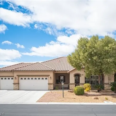 Buy this 4 bed house on 8571 Harwick Ranch Court in Las Vegas, NV 89131