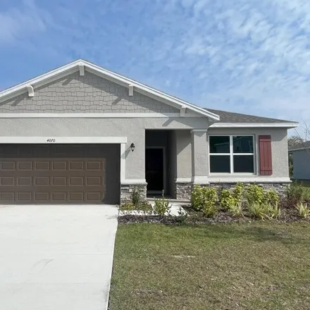 Rent this 4 bed house on unnamed road in Titusville, FL 32796