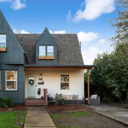 Buy this 4 bed house on 7420 Southeast Woodstock Boulevard in Portland, OR 97206