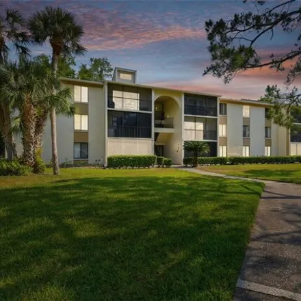 Buy this 2 bed condo on 1499 Pine Glen Lane in East Lake, FL 34688