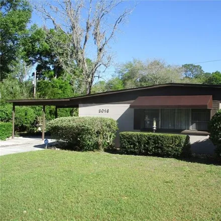 Buy this 4 bed house on 3068 Northeast 11th Drive in Gainesville, FL 32609