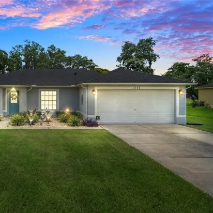 Buy this 3 bed house on 1347 Alster Ave in Spring Hill, Florida