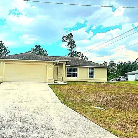 Buy this 3 bed house on 210 East 10th Street in Lehigh Acres, FL 33972