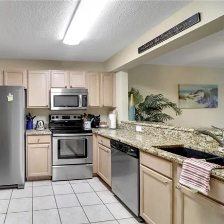 Image 2 - 4698 Flagship Drive, Lee County, FL 33919, USA - Condo for sale