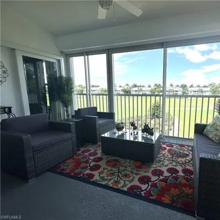 Rent this 2 bed condo on The Club at the Strand in 5840 Strand Boulevard, Naples