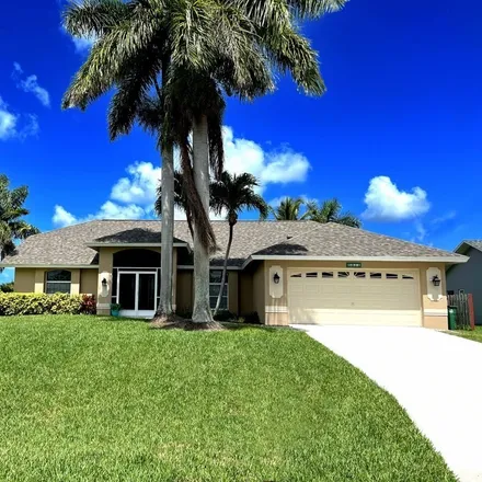 Buy this 4 bed house on 5034 Southwest 20th Place in Cape Coral, FL 33914