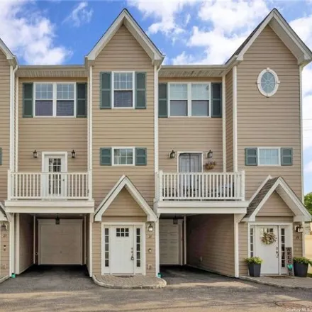Buy this 2 bed townhouse on 24 Fulton Street in Village of Farmingdale, NY 11735