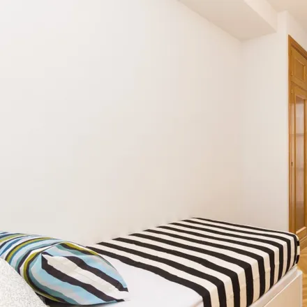 Rent this 8 bed room on Madrid in Calle de Oñate, 13