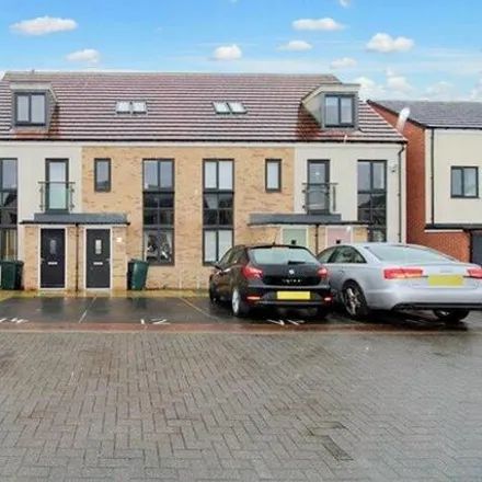 Rent this 3 bed townhouse on Lambley Way in Hazlerigg Village, NE13 9BZ