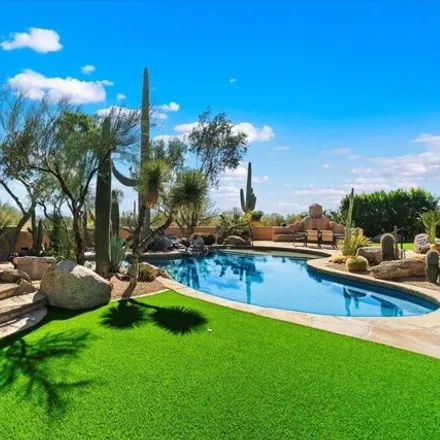 Buy this 4 bed house on 8375 East Via Dona Road in Scottsdale, AZ 85266