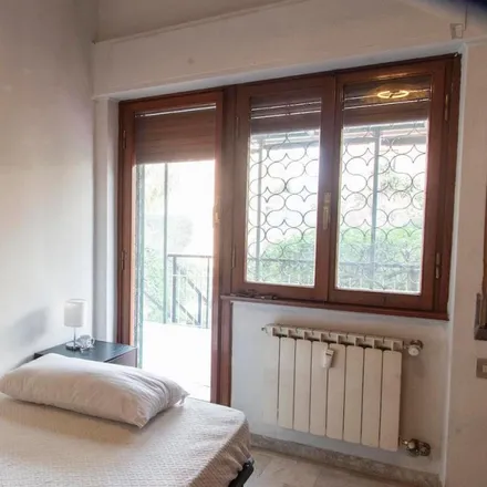 Rent this 6 bed room on Via dei Radiotelegrafisti in 00143 Rome RM, Italy