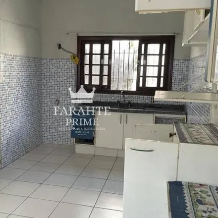Rent this 4 bed house on Rua Amapola in Real, Praia Grande - SP