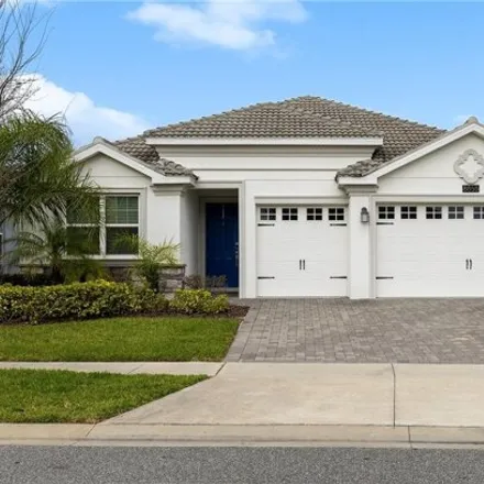 Buy this 4 bed house on 8855 Backspin Ln in Champions Gate, Florida