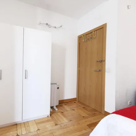 Rent this 6 bed room on Hostal Díaz in Calle de Atocha, 51