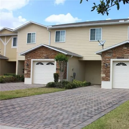 Rent this 3 bed townhouse on 10129 Shadow Leaf Court in Orange County, FL 32825