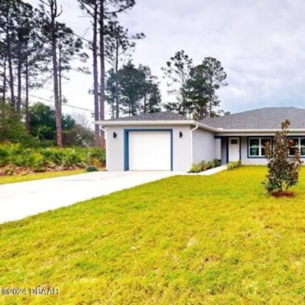 Buy this 6 bed house on 9 Slate Blue Place in Palm Coast, FL 32164