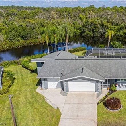 Buy this 4 bed house on Club House Road in Lee County, FL
