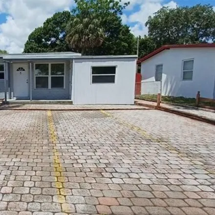 Buy this 4 bed house on 1099 Southwest 22nd Terrace in Fort Lauderdale, FL 33312