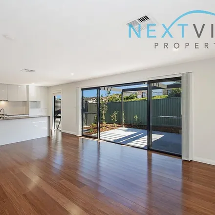Rent this 3 bed townhouse on Kariboo Lane in Mount Hutton NSW 2290, Australia