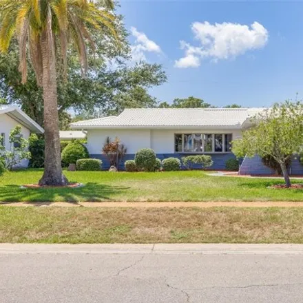 Buy this 4 bed house on 1392 Ambassador Drive in Clearwater, FL 33764