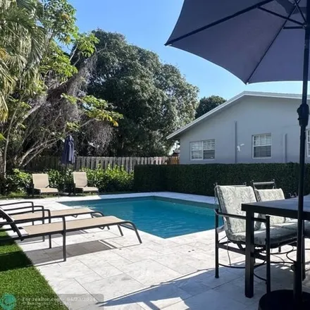 Buy this 4 bed house on 1705 Northeast 15th Avenue in Fort Lauderdale, FL 33305