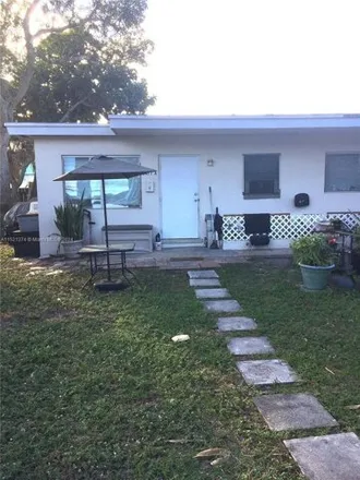 Buy this studio house on 3483 Northeast 13th Avenue in Coral Woods, Oakland Park