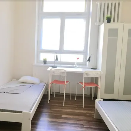 Rent this 4 bed room on Mokotowska 45 in 00-551 Warsaw, Poland