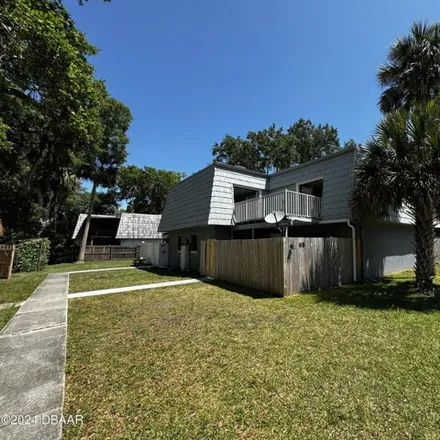Buy this 2 bed house on 68 Springwood Sq in Port Orange, Florida