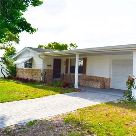 Rent this 2 bed house on 7435 Hollyridge Dr in New Port Richey, Florida