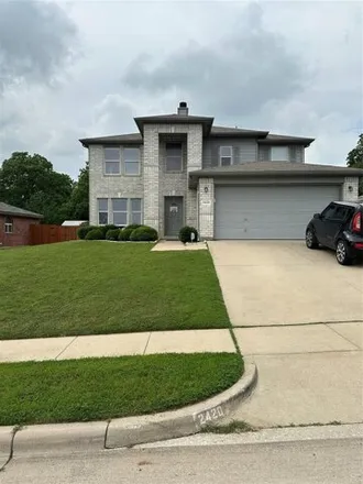 Buy this 4 bed house on 2436 Castle Pines Drive in Burleson, TX 76028